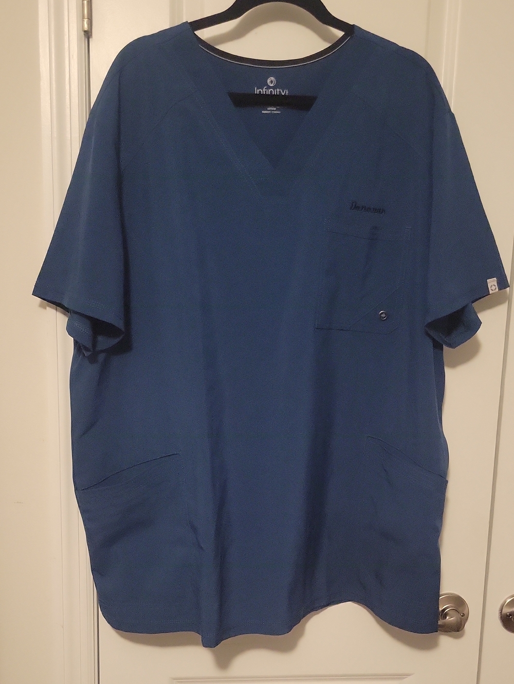 NFINITY Men’s V-Neck Scrub Top in Deep Blue Donovan Name Above Pocket